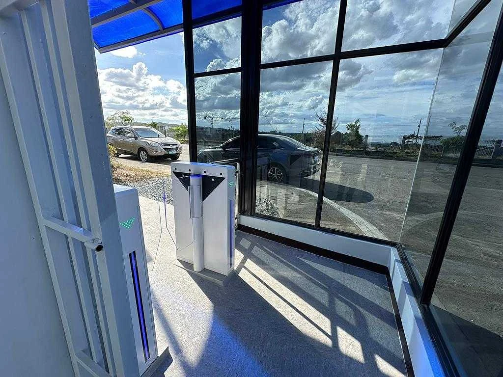 Access control gates at a facility perimeter entrance