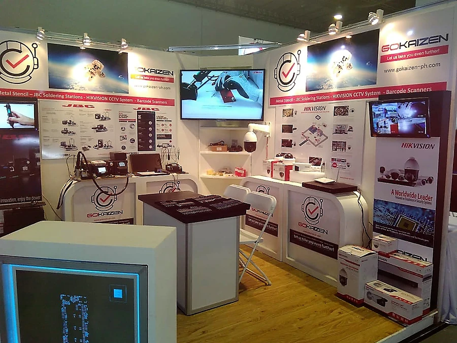 Equipment laid out across the stand, with partner manufacturers' panels behind